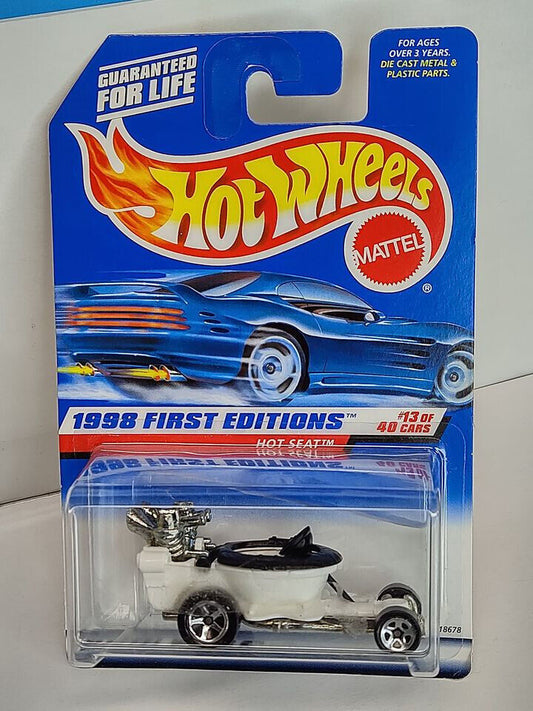 Hot Wheels 1998 First Editions #13 Hot Seat GLUE RESIDUE ON BLISTR/TEAR (Loc M)