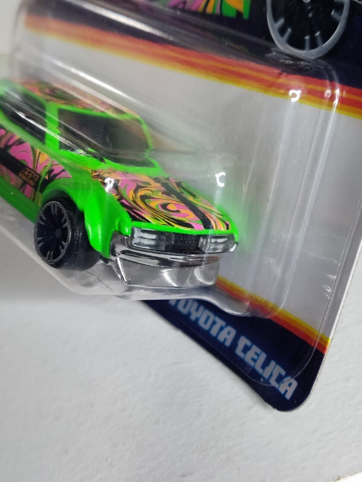 Hot Wheels #HRW67 Neon Speeders Series #1 '70 Toyota Celica BOTTOM EDGE BENT