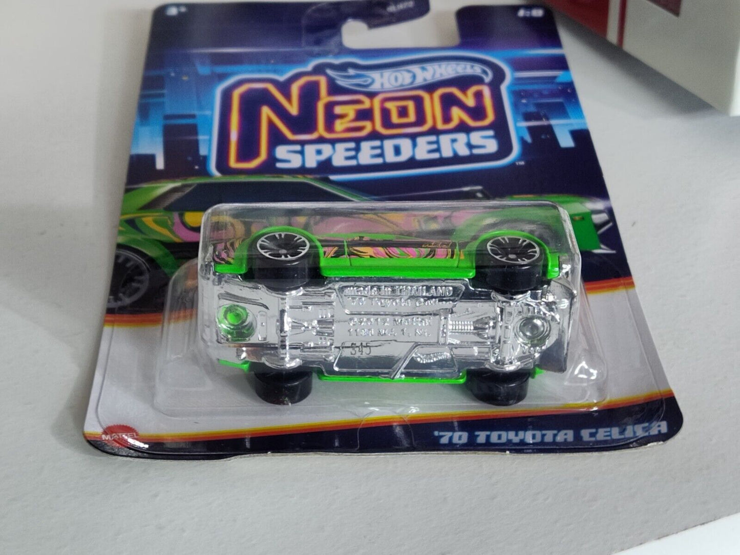 Hot Wheels #HRW67 Neon Speeders Series #1 '70 Toyota Celica BOTTOM EDGE BENT