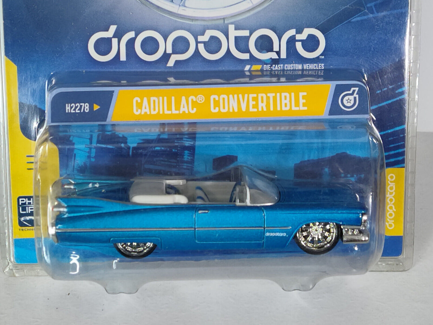 Hot Wheels Dropotaro Series Cadillac Convertible PACKAGE BADLY SCRATCHED UP!!!