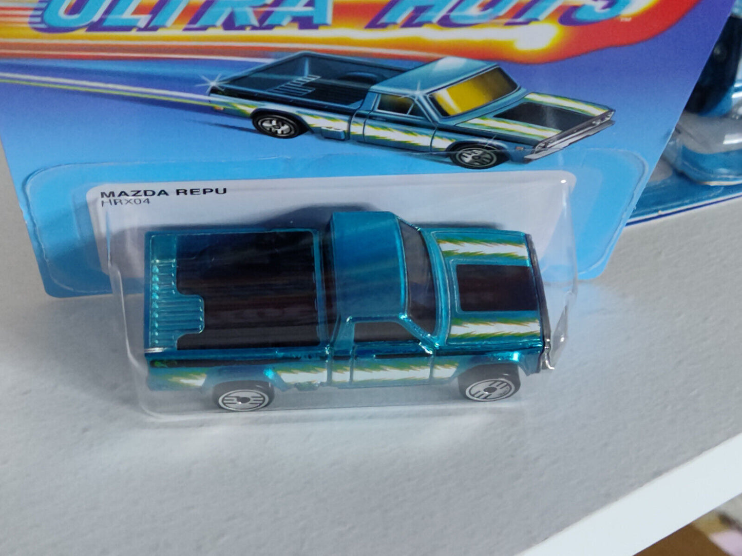 Hot Wheels #HRX04 Ultra Hots Series #5 Mazda Repu  LH CRNR BENT/CREASED (Loc G)