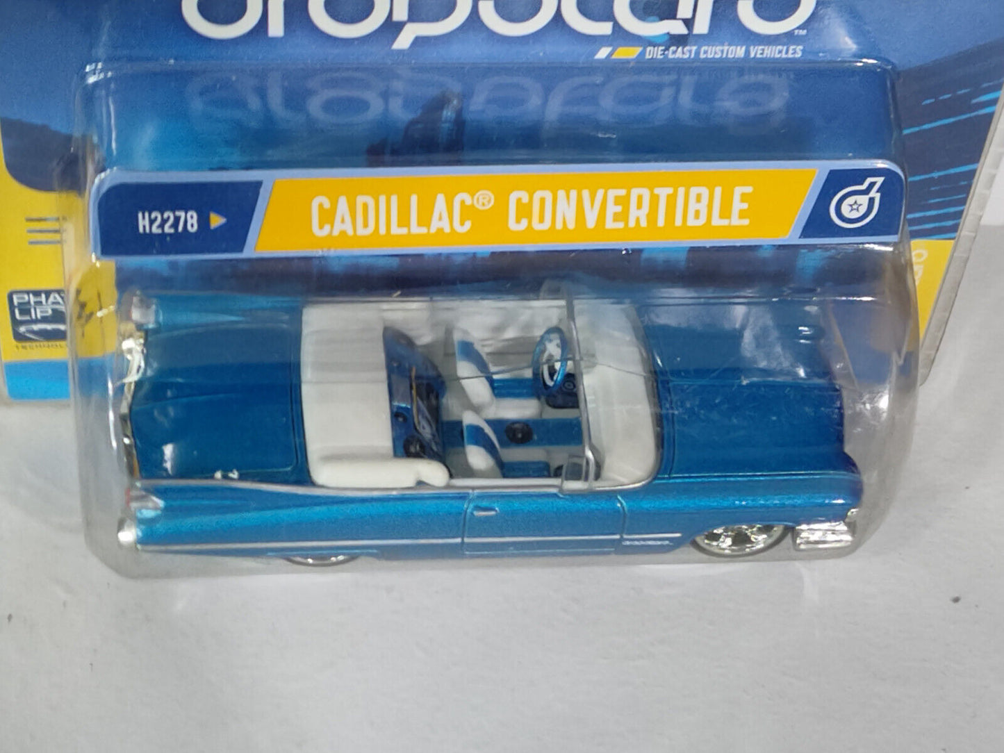 Hot Wheels Dropotaro Series Cadillac Convertible PACKAGE BADLY SCRATCHED UP!!!