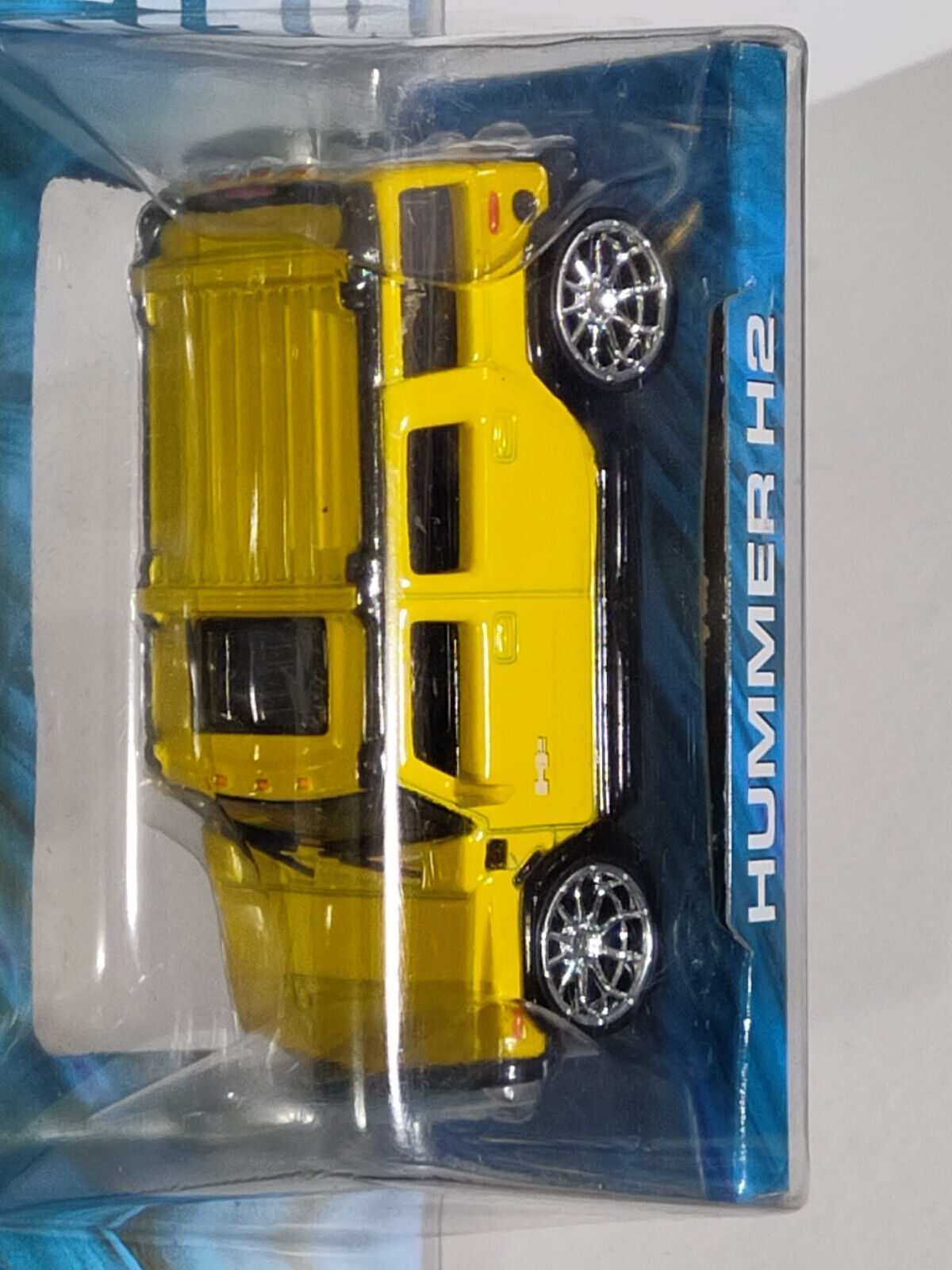 Hot Wheels WHIPS West Coast Customs Hummer H2 Yellow PACKAGE HAS SCRAPES ALL OVE