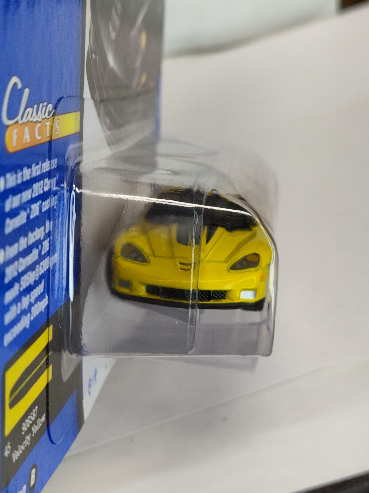 Johnny Lightning Gold Collection 2012 Chevy Corvette X06 SMALL SPOT PAPER MISSIN